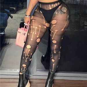 Black and Tan Sheer Leggings with Intricate Patterns